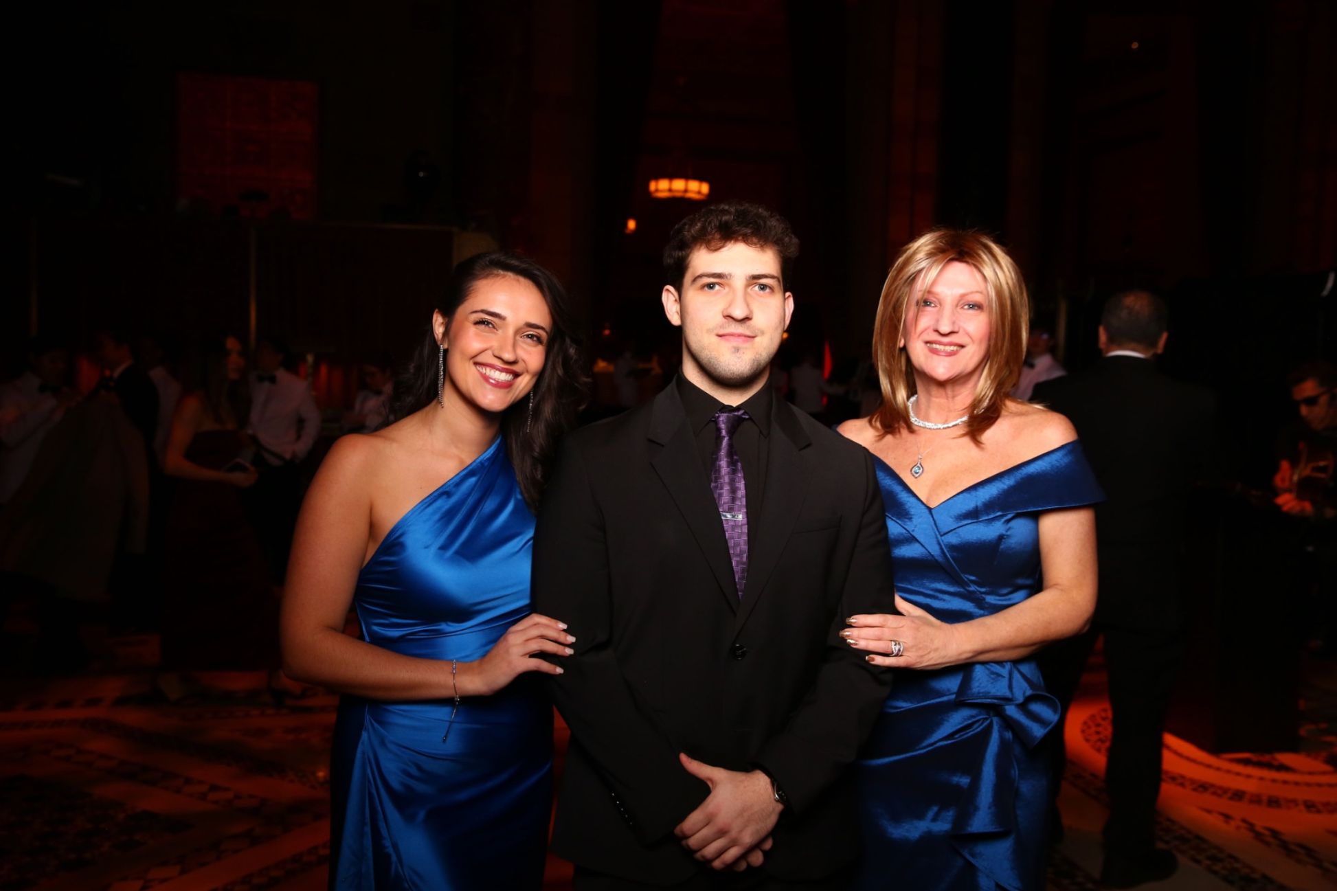 Scholarship Award Recipients and siblings Christina and Alex Bogdani celebrate their accomplishments with their mother.