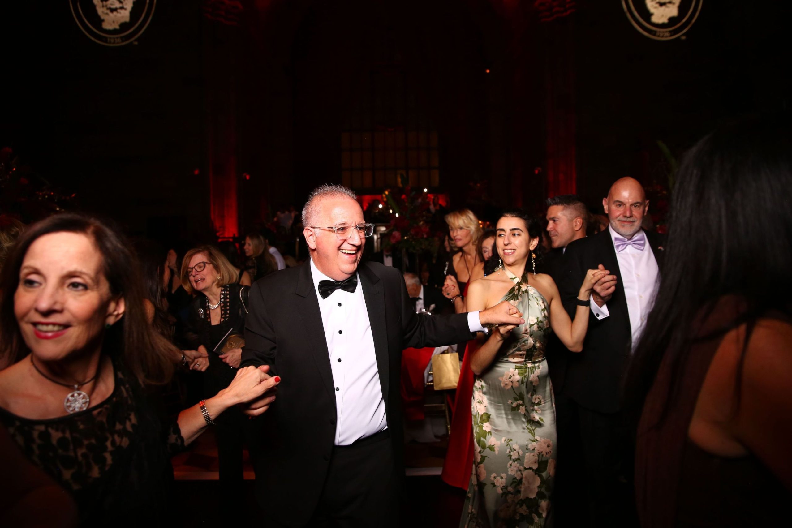 Greek dancing closes the night, as tradition demands.