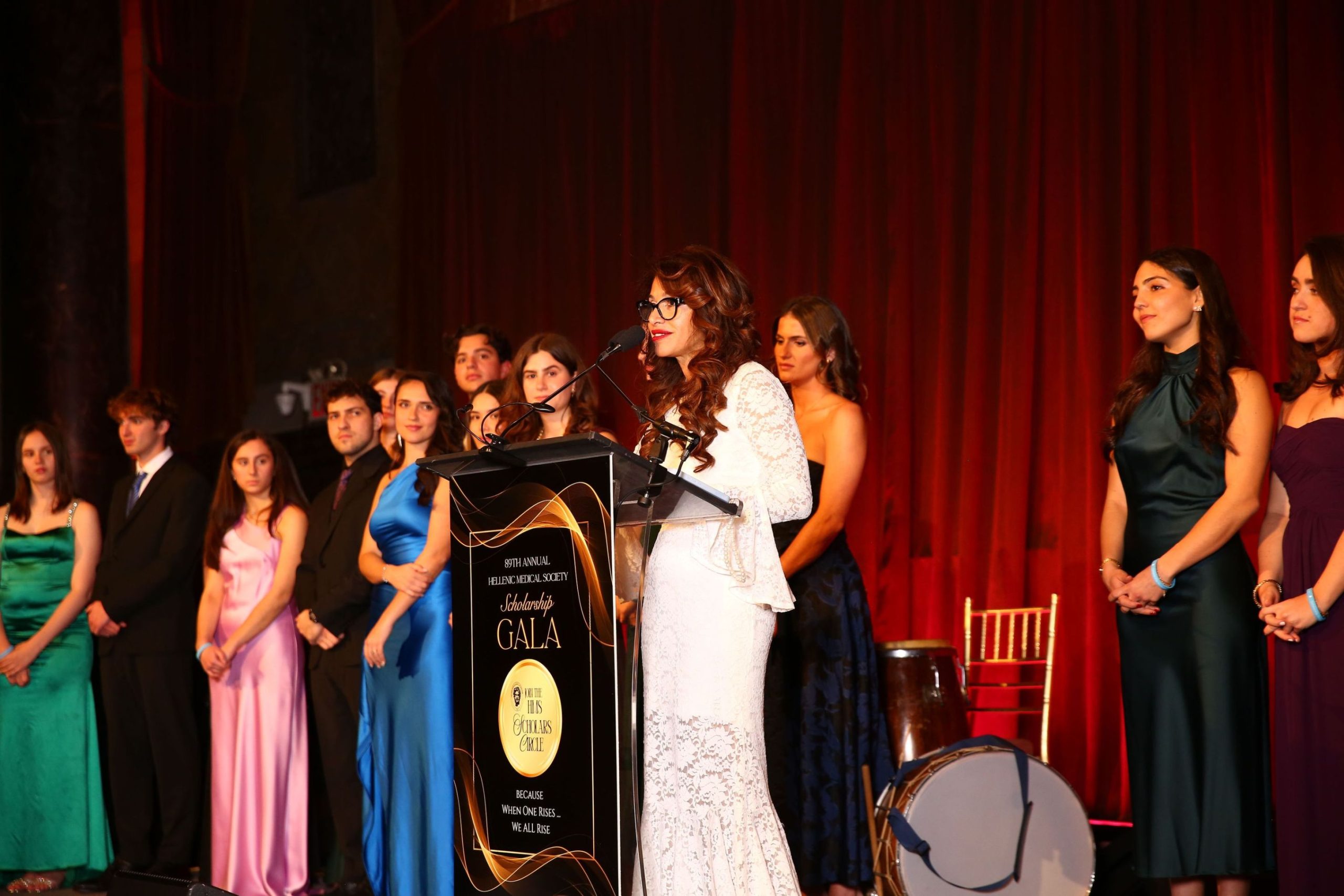 Scholars gather on stage for the evening’s presentation.