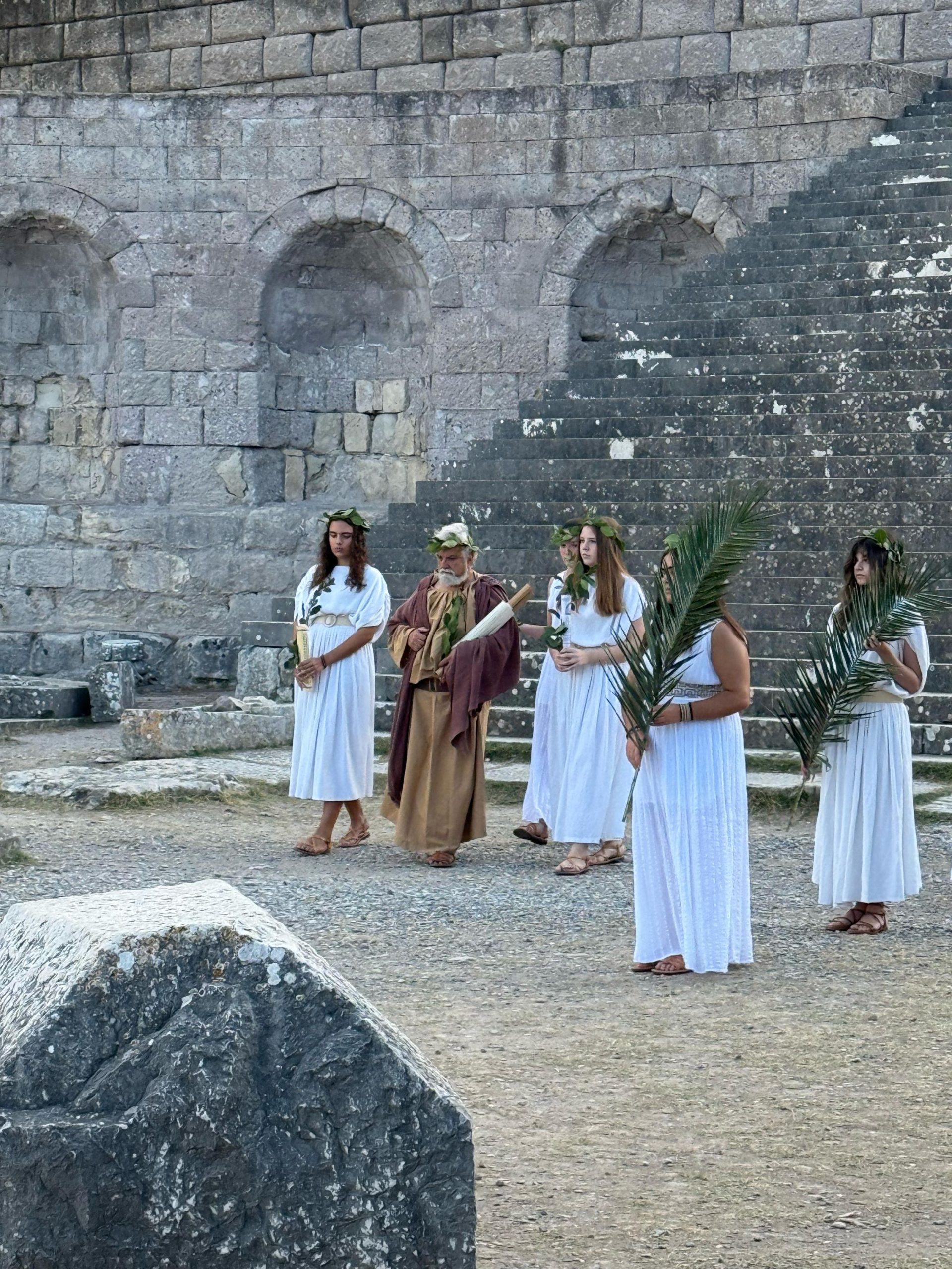 The ceremonial procession, palm fronds in hand.