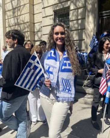 A Young Professionals member at the Greek Parade.