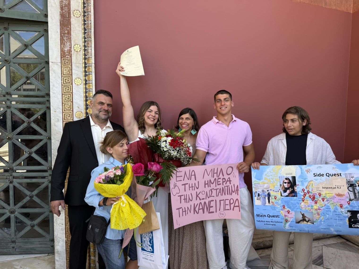 Graduation day in Athens — family celebrates an HMS scholar.