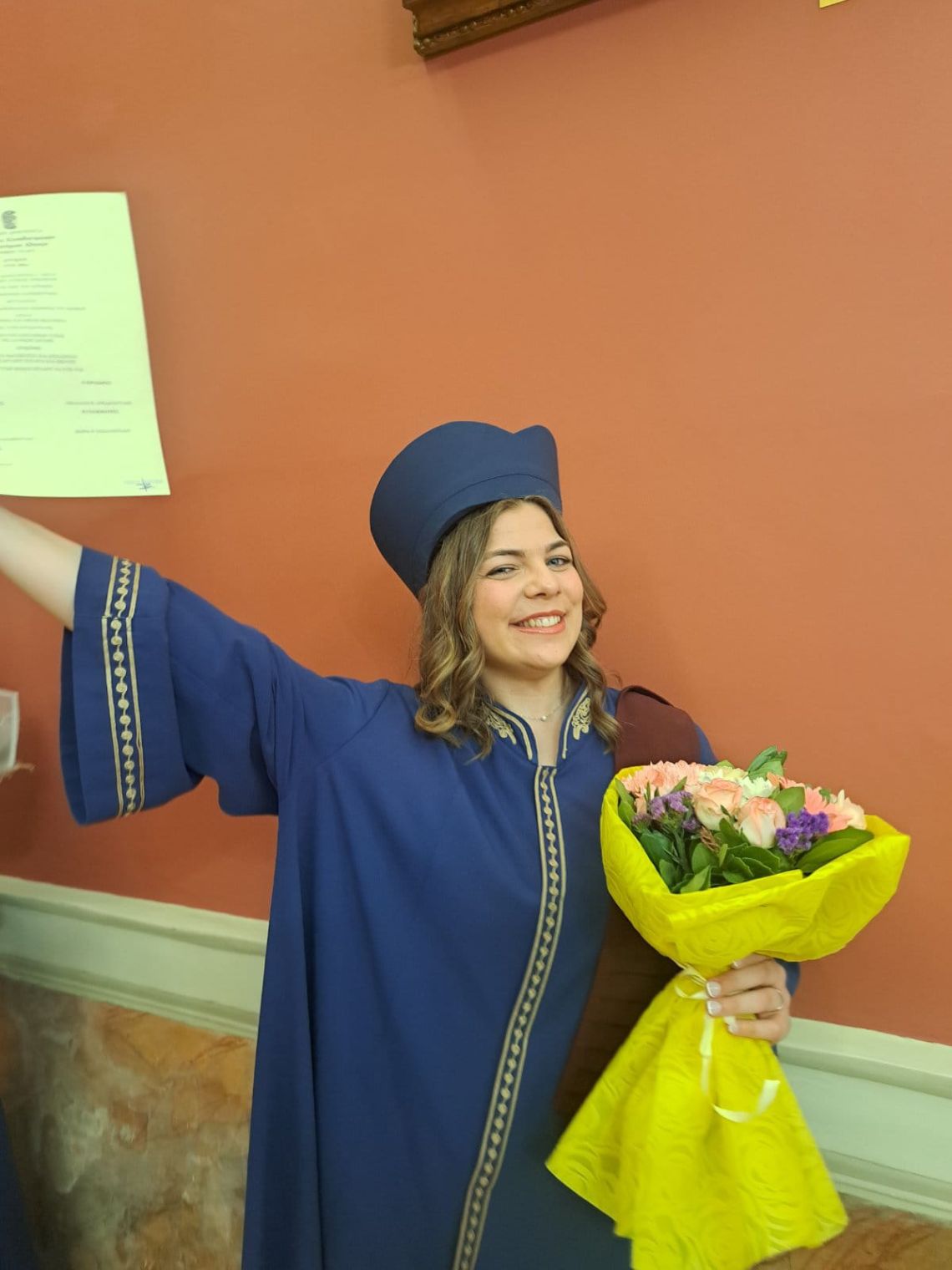 An HMS scholar graduates from the Medical School of Athens.