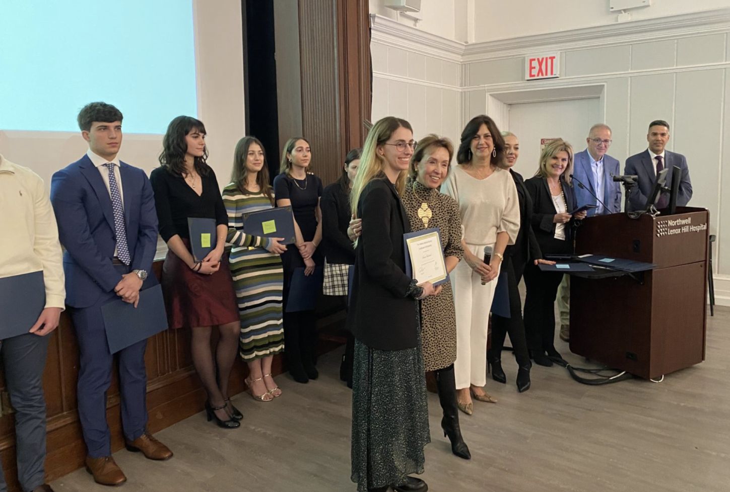 The HMS Scholarship Committee presents recipients with their Scholarship certificates (Drs. Miranda Kofinas, Lorraine Chrisomalis, Eleni Gouzoulis-Koutsos, Antonios Gasparis).
