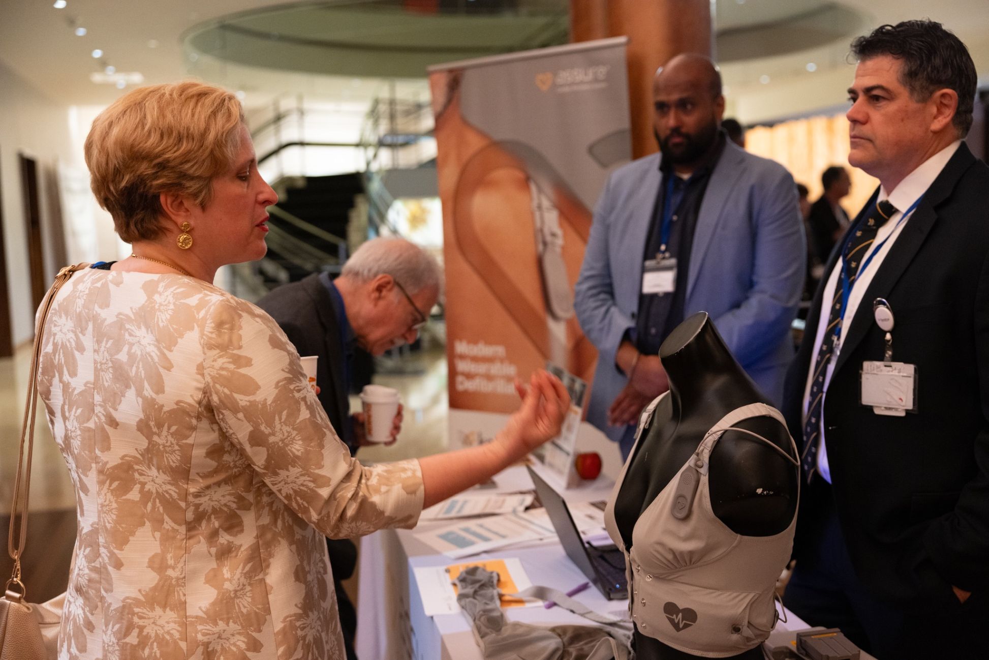 Exploring medical innovation at the Symposium exhibits.