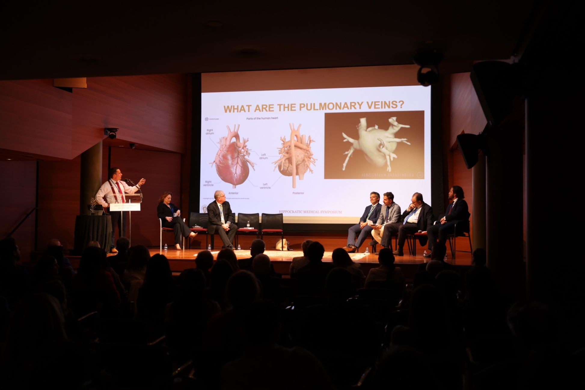 Expert panel on stage at the 2026 Hippocratic Medical Symposium.