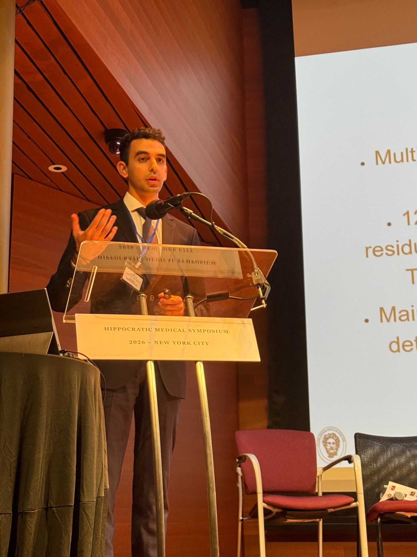 A Young Professional presents his abstract at the 2026 Hippocratic Medical Symposium.